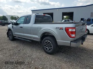 2023 Ford F-150 XL with VIN 1FTEX1EP9PKE34381, listed as a Copart auction lot 63938505 with 13,933 mi miles and Salvage title. Bid and sale history available at DreamBid. Image 2.
