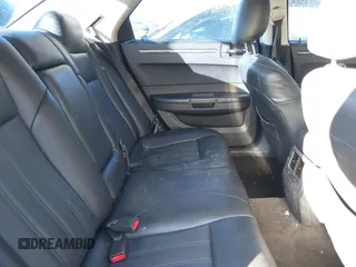 2009 Chrysler 300 LX with VIN 2C3KA43D69H565894, listed as a IAAI auction lot 41283079 with 233,098 mi miles. Bid and sale history available at carsss.com. Image 8.