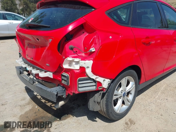 2014 Ford Focus SE z VIN 1FADP3K24EL119243, wystawiony jako IAAI lot #42121759 z przebiegiem 123 887 mil mil oraz . Historia ofert i sprzedaży dostępna na DreamBid. Obrazek 13.