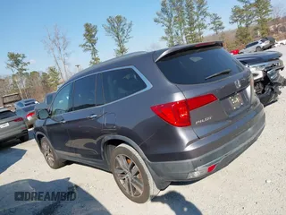 2016 Honda Pilot Elite with VIN 5FNYF6H01GB050555, listed as a IAAI auction lot 41670197 with 140,000 mi miles. Bid and sale history available at carsss.com. Image 14.