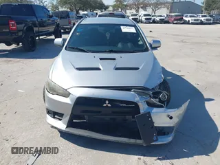 2013 Mitsubishi Lancer Evolution MR with VIN JA32W5FV6DU013470, listed as a IAAI auction lot 41544077 with 124,262 mi miles. Bid and sale history available at carsss.com. Image 12.