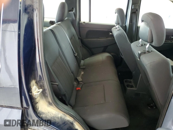 2012 Jeep Liberty Sport z VIN 1C4PJMAK9CW129035, wystawiony jako Copart lot #57905335 z przebiegiem 137 701 mil mil oraz Szkoda całkowita • Salvage title. Historia ofert i sprzedaży dostępna na DreamBid. Obrazek 11.