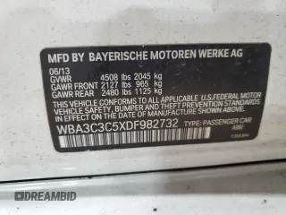 2013 BMW 3 Series 320i xDrive with VIN WBA3C3C5XDF982732, listed as a Copart auction lot 62852385 with 134,466 mi miles and Salvage title. Bid and sale history available at DreamBid. Image 13.