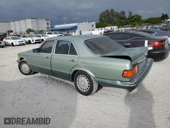 1989 Mercedes-Benz 300 with VIN WDBCA24D0KA457759, listed as a Copart auction lot 47920625 with 174,332 mi miles and Salvage Title. Bid and sale history available at DreamBid. Image 2.