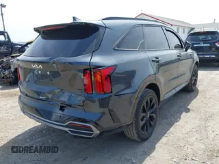 2023 Kia Sorento SX z VIN 5XYRK4LF0PG171635, wystawiony jako IAAI lot #42116649 z przebiegiem 75 348 mil mil oraz . Historia ofert i sprzedaży dostępna na DreamBid. Obrazek 4.