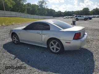 2000 Ford Mustang GT z VIN 1FAFP42X8YF309852, wystawiony jako Copart lot #57959605 z przebiegiem 251 001 mil mil oraz Szkoda całkowita • Salvage title. Historia ofert i sprzedaży dostępna na DreamBid. Obrazek 2.