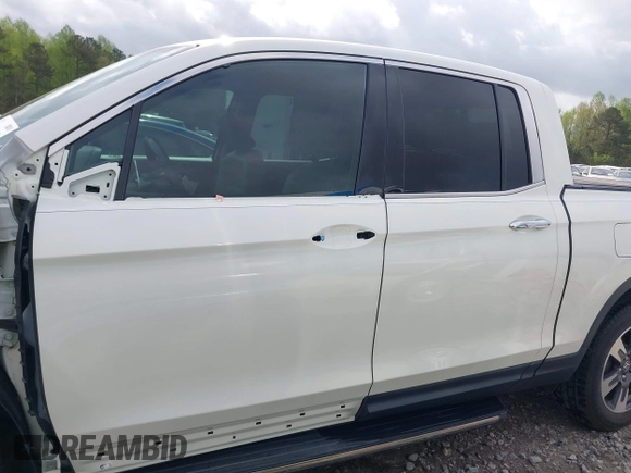2019 Honda Ridgeline RTL-E with VIN 5FPYK3F78KB018356, listed as a IAAI auction lot 41946363 with 61,472 mi miles and . Bid and sale history available at DreamBid. Image 15.