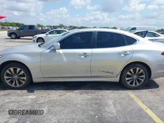 2014 Infiniti Q70 Luxe z VIN JN1BY1AP5EM260464, wystawiony jako IAAI lot #42372872 z przebiegiem 116 756 mil mil oraz . Historia ofert i sprzedaży dostępna na DreamBid. Obrazek 6.