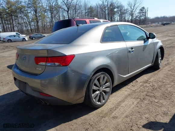 2011 Kia Forte Koup SX with VIN KNAFW6A32B5368820, listed as a IAAI auction lot 41703308 with 184715 miles. Bid and sale history available at carsss.com. Image 4.