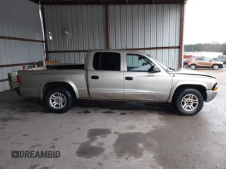 2003 Dodge Dakota SLT with VIN 1D7HL48N93S303911, listed as a IAAI auction lot 41536555 with 383,306 mi miles. Bid and sale history available at carsss.com. Image 14.