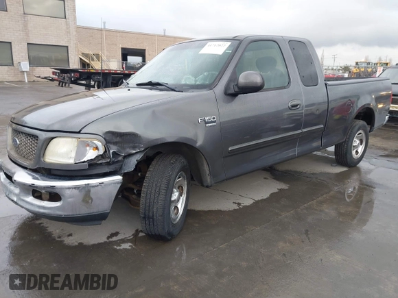2003 Ford F-150 XL with VIN 1FTRX17W03NB51687, listed as a IAAI auction lot 41712022 with 183,428 mi miles. Bid and sale history available at carsss.com. Image 17.