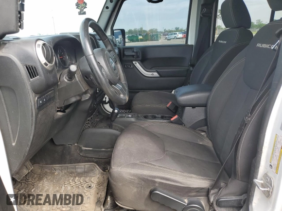 2017 Jeep Wrangler Unlimited Rubicon Recon with VIN 1C4BJWFG5HL511601, listed as a Copart auction lot 62656715 with 86,465 mi miles and Salvage title. Bid and sale history available at DreamBid. Image 7.