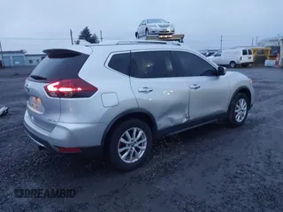 2019 Nissan Rogue SV with VIN KNMAT2MV2KP519056, listed as a IAAI auction lot 41236014 with 113,031 mi miles. Bid and sale history available at carsss.com. Image 4.