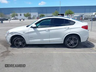 2015 BMW X4 xDrive28i with VIN 5UXXW3C5XF0M89147, listed as a IAAI auction lot 42779290 with 120,773 mi miles and . Bid and sale history available at DreamBid. Image 13.
