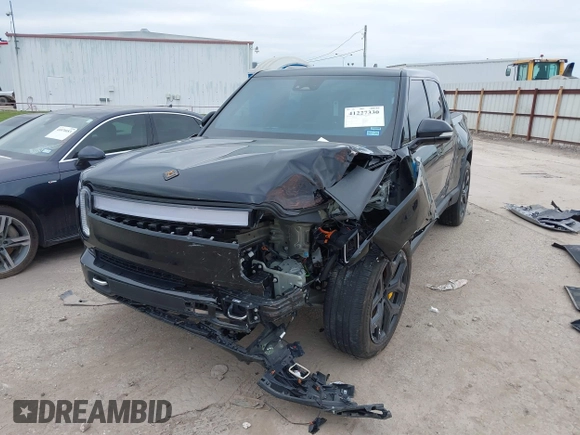 2023 Rivian R1T Adventure with VIN 7FCTGAAA2PN023485, listed as a IAAI auction lot 41227330 with 1 mi miles. Bid and sale history available at carsss.com. Image 17.