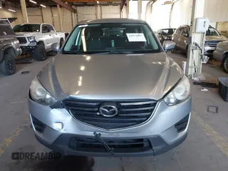 2016 Mazda CX-5 Sport with VIN JM3KE2BE5G0720507, listed as a IAAI auction lot 41872003 with 160,727 mi miles and . Bid and sale history available at carsss.com. Image 12.