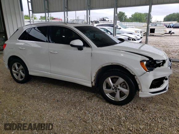 2021 Audi Q3 Premium with VIN WA1AUCF3XM1094216, listed as a Copart auction lot 58710615 with 86,743 mi miles and Salvage title. Bid and sale history available at DreamBid. Image 4.