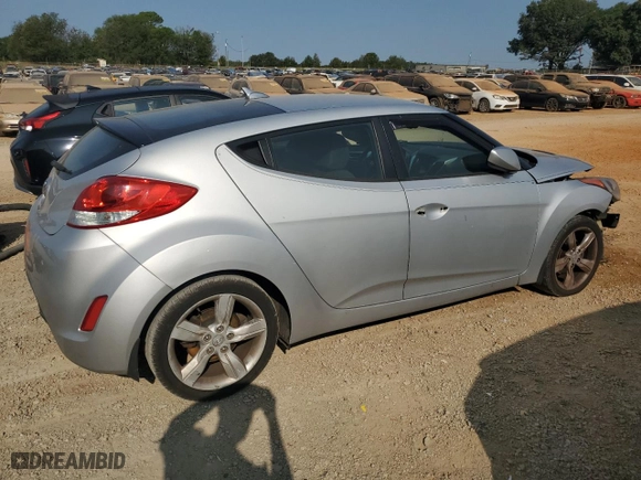 2014 Hyundai Veloster with VIN KMHTC6AD3EU182927, listed as a Copart auction lot 71044954 with 174,222 mi miles and Salvage Title. Bid and sale history available at carsss.com. Image 3.