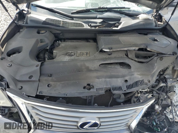 2013 Lexus RX 450h z VIN JTJZB1BA4D2410952, wystawiony jako Copart lot #61969555 z przebiegiem Nie podano mil oraz Szkoda całkowita • Salvage title. Historia ofert i sprzedaży dostępna na DreamBid. Obrazek 12.