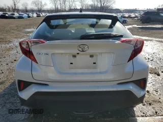 2019 Toyota C-HR XLE z VIN JTNKHMBX4K1061895, wystawiony jako Copart lot #49095605 z przebiegiem 109 974 mil mil oraz Szkody całkowita. Historia ofert i sprzedaży dostępna na DreamBid. Obrazek 6.