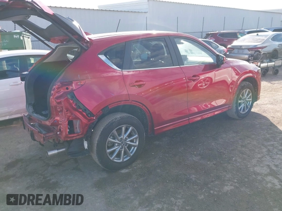 2024 Mazda CX-5 S Carbon Edition z VIN JM3KFBCL1R0432674, wystawiony jako IAAI lot #41287310 z przebiegiem 10 526 mil mil oraz . Historia ofert i sprzedaży dostępna na DreamBid. Obrazek 4.