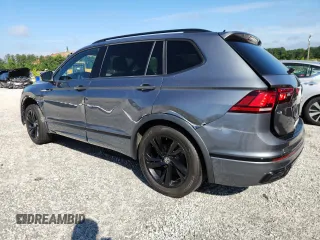 2023 Volkswagen Tiguan SE R-Line Black with VIN 3VVCB7AX3PM056471, listed as a Copart auction lot 60679225 with 94,752 mi miles and Clean title. Bid and sale history available at DreamBid. Image 2.