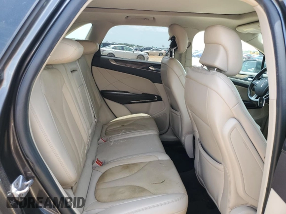 2017 Lincoln MKC Reserve with VIN 5LMCJ3C96HUL27604, listed as a Copart auction lot 58562805 with 90,279 mi miles and Salvage title. Bid and sale history available at DreamBid. Image 11.