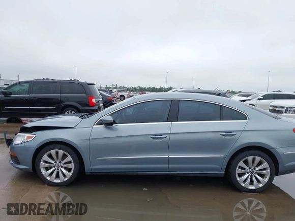 2012 Volkswagen CC Sport z VIN WVWMN7AN4CE514222, wystawiony jako IAAI lot #42185202 z przebiegiem 92 656 mil mil oraz . Historia ofert i sprzedaży dostępna na DreamBid. Obrazek 14.