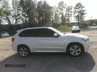 2014 BMW X5 xDrive35i with VIN 5UXKR0C56E0H18800, listed as a IAAI auction lot 40843200 with 129,991 mi miles. Bid and sale history available at carsss.com. Image 13.