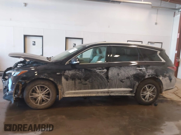 2019 Infiniti QX60 Luxe with VIN 5N1DL0MM6KC548023, listed as a IAAI auction lot 42267143 with 94,231 mi miles and . Bid and sale history available at DreamBid. Image 14.