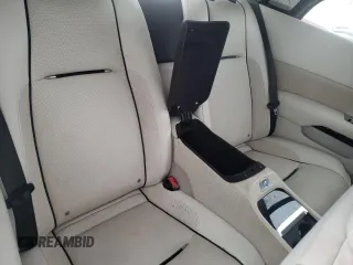 2014 Rolls-Royce Wraith z VIN SCA665C5XEUX84336, wystawiony jako Copart lot #73181343 z przebiegiem 34 367 mil mil oraz Szkody całkowita. Historia ofert i sprzedaży dostępna na DreamBid. Obrazek 10.