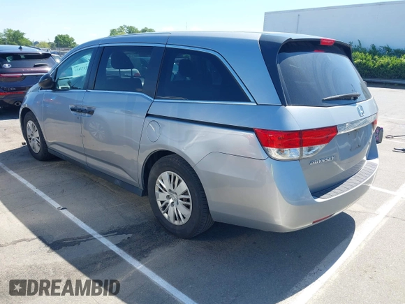 2016 Honda Odyssey LX z VIN 5FNRL5H22GB092614, wystawiony jako IAAI lot #42173633 z przebiegiem 159 387 mil mil oraz . Historia ofert i sprzedaży dostępna na DreamBid. Obrazek 3.