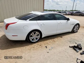 2015 Jaguar XJ Portfolio with VIN SAJWA2GZ7F8V82990, listed as a Copart auction lot 63325535 with 113,892 mi miles and Salvage title. Bid and sale history available at DreamBid. Image 3.