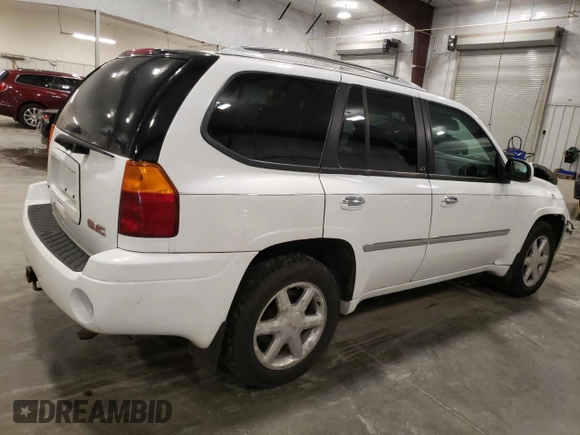 2009 GMC Envoy SLT with VIN 1GKDT43S492124405, listed as a Copart auction lot 81337354 with 154,045 mi miles and Salvage Title. Bid and sale history available at carsss.com. Image 3.