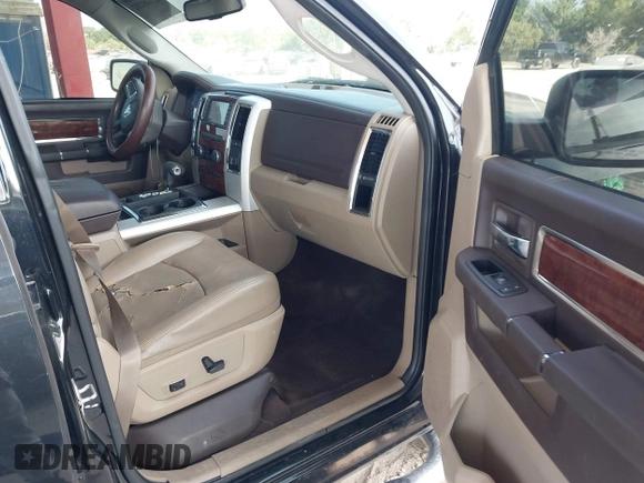 2009 Dodge 1500 SLT with VIN 1D3HV13T69J519018, listed as a IAAI auction lot 42108182 with 210,733 mi miles and . Bid and sale history available at carsss.com. Image 5.