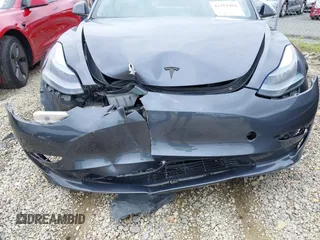2023 Tesla Model 3 with VIN 5YJ3E1EA0PF473754, listed as a IAAI auction lot 42351494 with Not provided miles and . Bid and sale history available at DreamBid. Image 13.