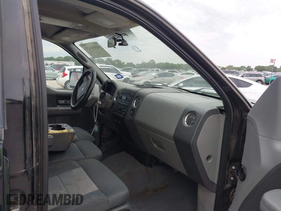 2007 Ford F-150 XLT with VIN 1FTRW12W67KC73472, listed as a IAAI auction lot 42450421 with 191,653 mi miles and . Bid and sale history available at DreamBid. Image 5.