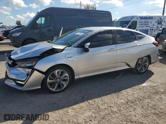 2018 Honda Clarity Plug-In Hybrid with VIN JHMZC5F12JC015478, listed as a Copart auction lot 73971644 with 64,031 mi miles and Clean Title. Bid and sale history available at carsss.com. Image 1.