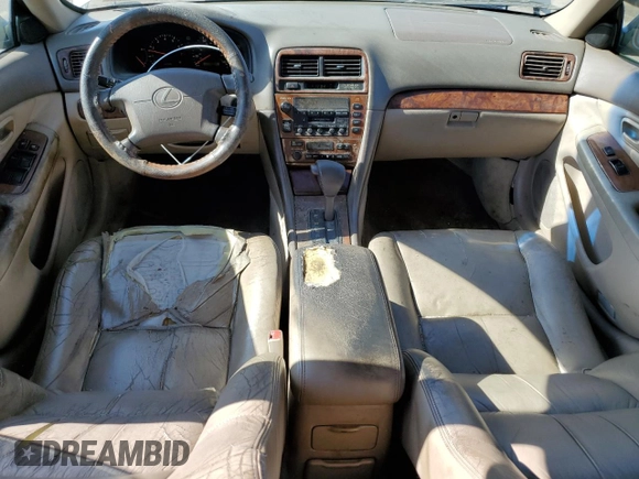 2000 Lexus ES 300 with VIN JT8BF28GXY5091263, listed as a Copart auction lot 61767595 with 250,041 mi miles and Salvage title. Bid and sale history available at DreamBid. Image 8.