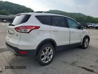 2016 Ford Escape SE z VIN 1FMCU9G97GUB45352, wystawiony jako Copart lot #60001055 z przebiegiem 93 685 mil mil oraz Szkoda całkowita • Salvage title. Historia ofert i sprzedaży dostępna na DreamBid. Obrazek 3.