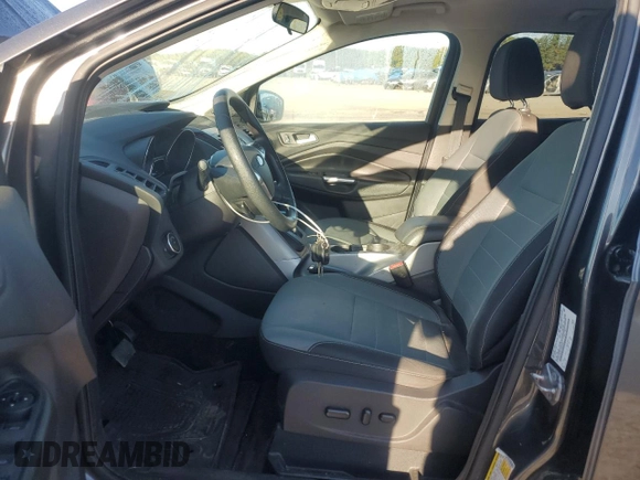 2016 Ford Escape SE with VIN 1FMCU9GX0GUB86582, listed as a Copart auction lot 74035344 with 115,538 mi miles and Salvage Title. Bid and sale history available at DreamBid. Image 7.