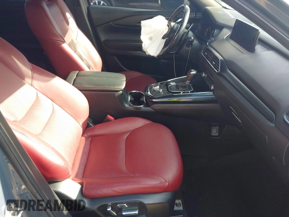 2021 Mazda CX-9 Grand Touring with VIN JM3TCADY7M0528223, listed as a IAAI auction lot 42395861 with 57,767 mi miles and . Bid and sale history available at DreamBid. Image 5.
