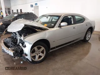 2010 Dodge Charger SXT with VIN 2B3CA3CV1AH291075, listed as a IAAI auction lot 41576216 with 144,602 mi miles. Bid and sale history available at carsss.com. Image 20.