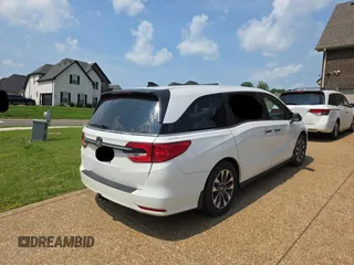 2023 Honda Odyssey EX-L z VIN 5FNRL6H67PB013527, wystawiony jako Copart lot #59705385 z przebiegiem 12 262 mil mil oraz Czysty tytuł • Clean title. Historia ofert i sprzedaży dostępna na DreamBid. Obrazek 4.
