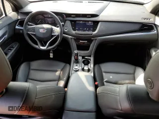 2024 Cadillac XT6 FWD Luxury z VIN 1GYKPAR47RZ705252, wystawiony jako Copart lot #49244015 z przebiegiem 26 838 mil mil oraz Szkody całkowita. Historia ofert i sprzedaży dostępna na DreamBid. Obrazek 8.