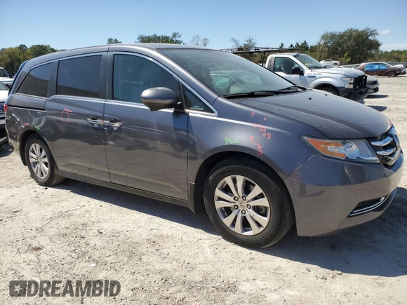 2016 Honda Odyssey EX-L with VIN 5FNRL5H6XGB100929, listed as a Copart auction lot 48889205 with 148,766 mi miles and Salvage Title. Bid and sale history available at DreamBid. Image 4.