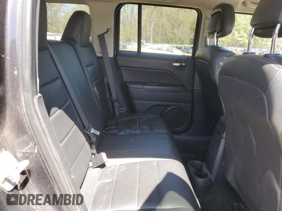 2016 Jeep Patriot High Altitude with VIN 1C4NJPFA7GD582791, listed as a Copart auction lot 52099685 with 83,595 mi miles and Salvage Title. Bid and sale history available at DreamBid. Image 12.