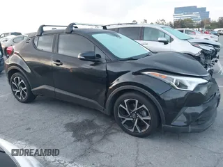 2019 Toyota C-HR XLE with VIN JTNKHMBXXK1034717, listed as a IAAI auction lot 41939078 with 56,309 mi miles. Bid and sale history available at carsss.com. Image 14.