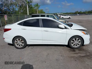 2014 Hyundai Accent GLS with VIN KMHCU4AE8EU608539, listed as a IAAI auction lot 41946784 with 106,709 mi miles and . Bid and sale history available at carsss.com. Image 12.