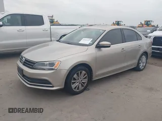 2015 Volkswagen Jetta Sedan 1.8T SE w/Connectivity with VIN 3VWD07AJ0FM231873, listed as a IAAI auction lot 42142327 with 156,230 mi miles. Bid and sale history available at carsss.com. Image 2.